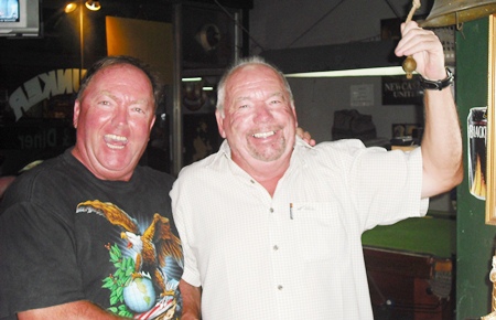 January ‘golfer of the month’ Tom Jones (right) celebrates with JJ Harney.